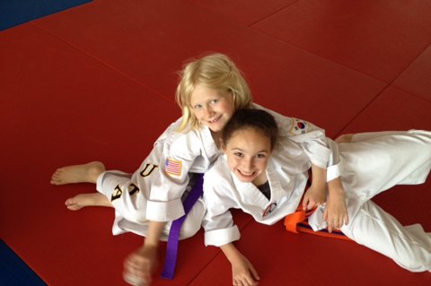 taekwondo kids wearing uniforms